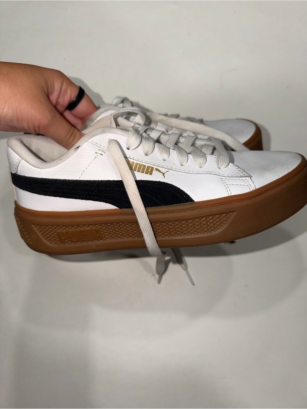 PUMA Women’s ' White Sneakers with Black Stripe and Gum Sole
